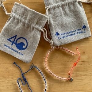 Set of 2 4Ocean Bracelets Never worn Blue/Orange